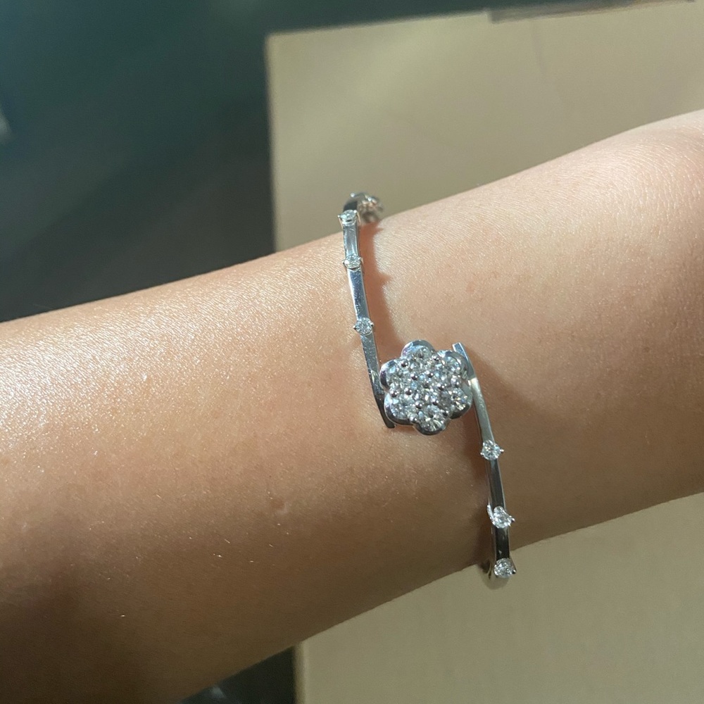 18karat white gold flower bangle with diamonds
